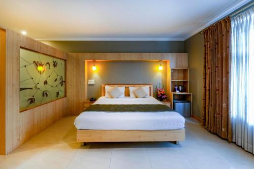 Katil atau katil-katil dalam bilik di Cross Roads Inn