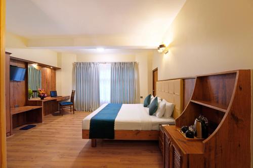 Televisyen dan/atau pusat hiburan di Cross Roads Inn