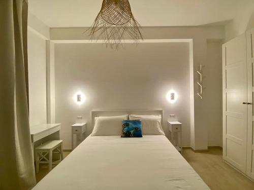 Ένα ή περισσότερα κρεβάτια σε δωμάτιο στο Sweet Home Naxos