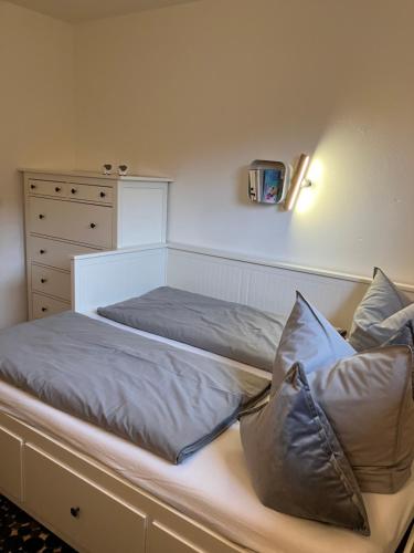 Postel nebo postele na pokoji v ubytování Ferienwohnung Am Bach, Riefensberg, Bregenzerwald