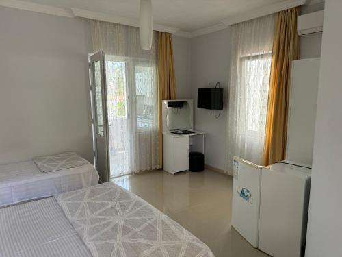 Postel nebo postele na pokoji v ubytování Twins Hotel