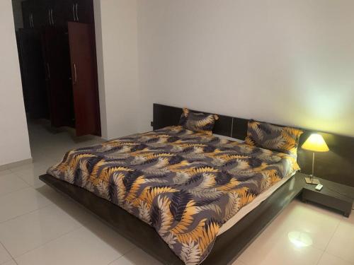 Кровать или кровати в номере Appartement meuble