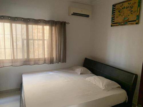 Кровать или кровати в номере Appartement meuble