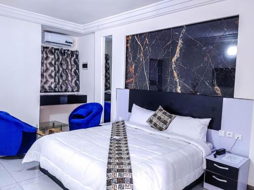 Ένα ή περισσότερα κρεβάτια σε δωμάτιο στο Hotel lewegri