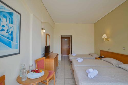 Postel nebo postele na pokoji v ubytování Neda Hotel