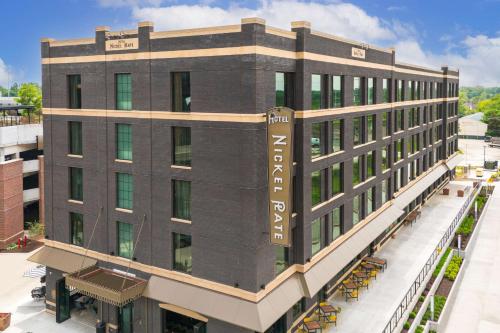 an aerial view of the front of a building at Hotel Nickel Plate Fishers, Tapestry Collection By Hilton in Fishers