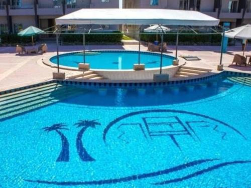 Πισίνα στο ή κοντά στο منتجع مايوركا الساحل الشمالي