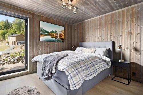 En eller flere senge i et værelse på Norefjell, Ny og flott hytte 4 soverom