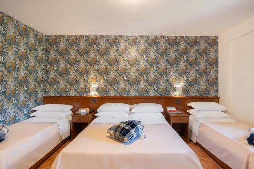 Hotel Rasinusにあるベッド