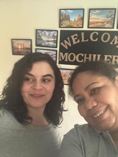 two women are standing next to each other at Guest house mochilero onomichi in Onomichi