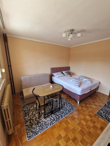 Ένα ή περισσότερα κρεβάτια σε δωμάτιο στο Cozy