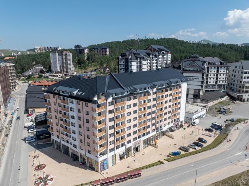 an overhead view of a large building in a city at VIP Bogić Apartmani - Recepcija in Zlatibor