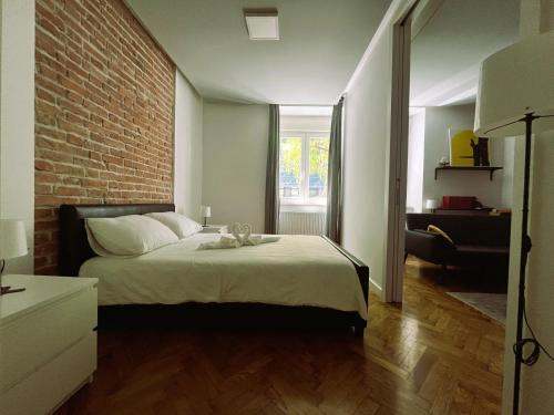 Postel nebo postele na pokoji v ubytování Knez Trpimir