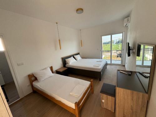 Postel nebo postele na pokoji v ubytování Magda apartments