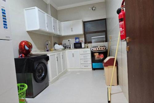 O bucătărie sau chicinetă la Seaside Apartment 301