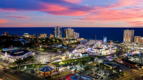 a view of a city at night with at Pier View - Spacious Home Sleeps 8 - Pet Friendly in Myrtle Beach