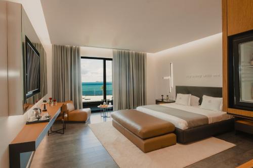 Postel nebo postele na pokoji v ubytování Maritim Marina Bay Resort SPA & Casino