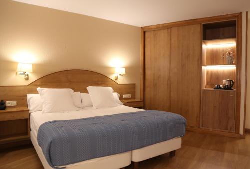 Ένα ή περισσότερα κρεβάτια σε δωμάτιο στο Hotel Maruxia *** Superior