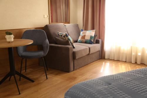 Χώρος καθιστικού στο Hotel Maruxia *** Superior