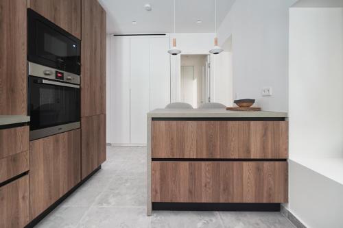 Η κουζίνα ή μικρή κουζίνα στο Plaka House - Boutique Apartments