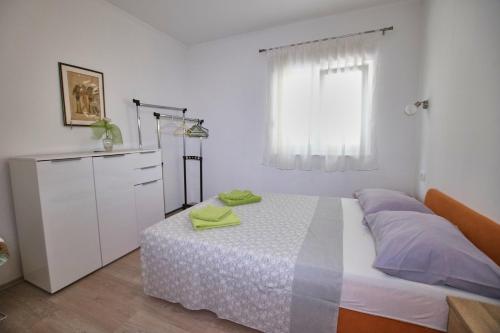 Postel nebo postele na pokoji v ubytování Roso