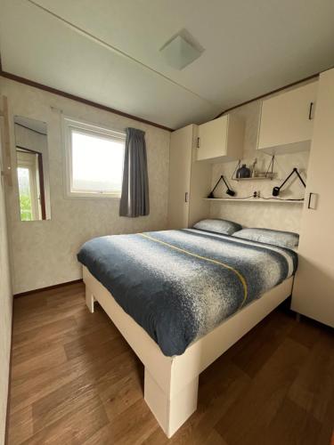 Postel nebo postele na pokoji v ubytování Chalet De Miranda