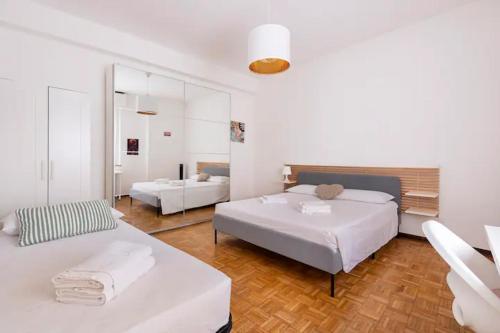 เตียงในห้องที่ nel cuore di Parma CENTRALISSIMO