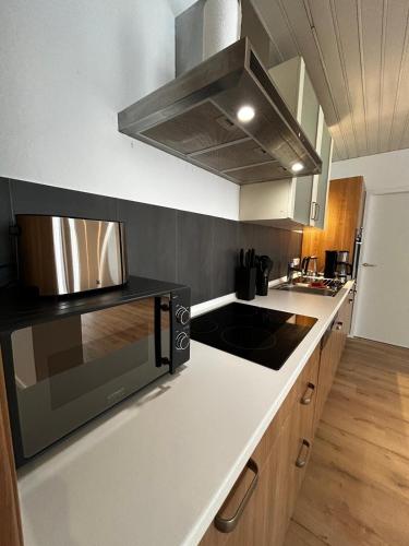 Cuisine ou kitchenette dans l'établissement B2 XXL 150m2 I NEU! I 8 P I Smart TV I 50m Edeka