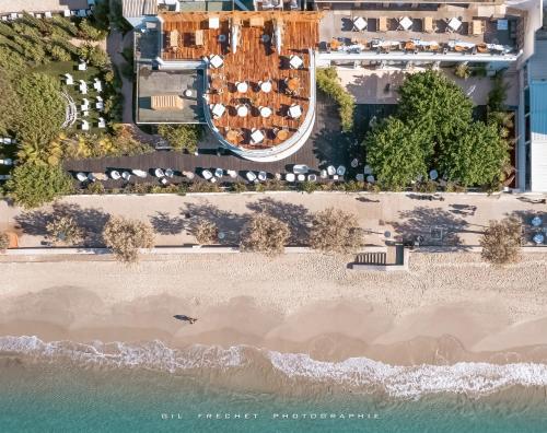 an aerial view of a beach with a resort at Grand Hotel Des Sablettes Plage, Curio Collection By Hilton in La Seyne-sur-Mer