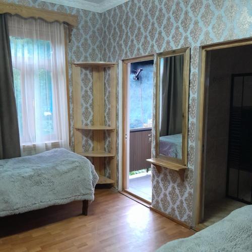 Cama o camas de una habitación en Guesthouse Sumaisha