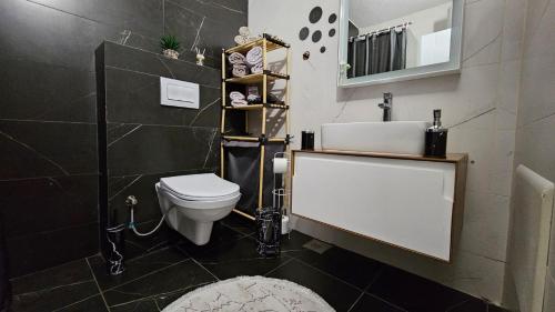 Koupelna v ubytování Value Living Apartment