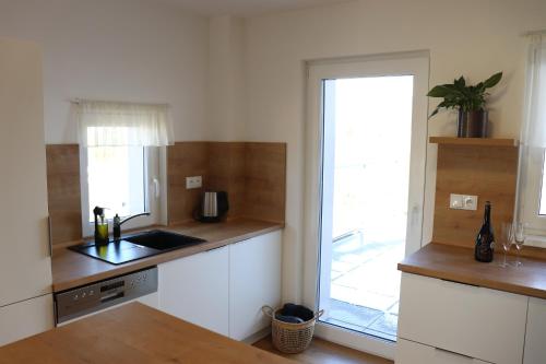 Una cocina o cocineta en Apartmány B. Němcové