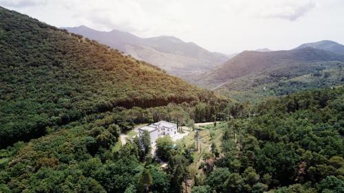 an aerial view of a house in the mountains at Ostello Ossigeno in Campodimele