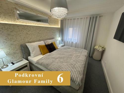 a bedroom with a bed in a room at EFIPA Glamour Apartments in Plzeň
