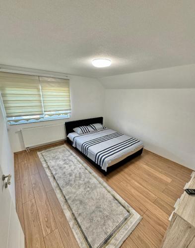 Postel nebo postele na pokoji v ubytování Ejna2