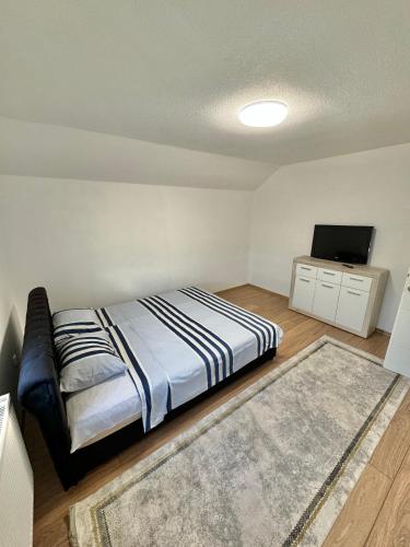 Postel nebo postele na pokoji v ubytování Ejna2