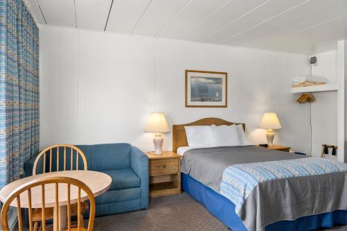 Postel nebo postele na pokoji v ubytování Lark Motel