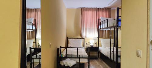 Postel nebo postele na pokoji v ubytování Light Hotel