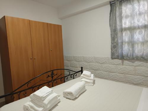 Ένα ή περισσότερα κρεβάτια σε δωμάτιο στο Villetta a Marzamemi a 50m dal mare