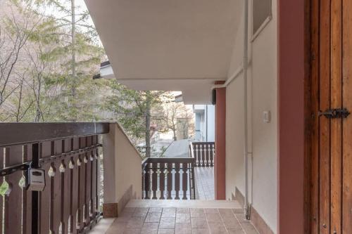an empty hallway of a house with a balcony at Chalet Aria Sottile in Sassotetto