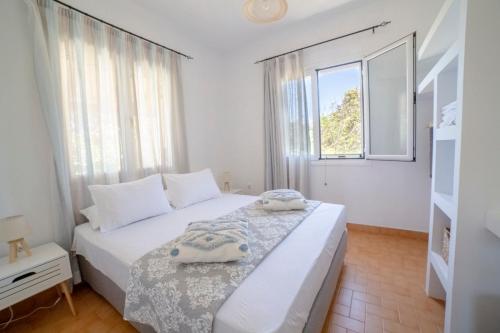 Postel nebo postele na pokoji v ubytování ELIZABETH by Antigone