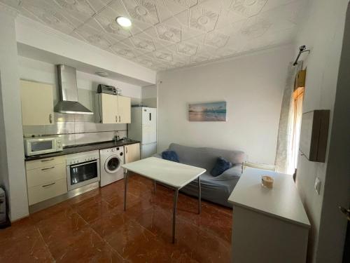 Kuchyň nebo kuchyňský kout v ubytování Apartamento La Línea 1