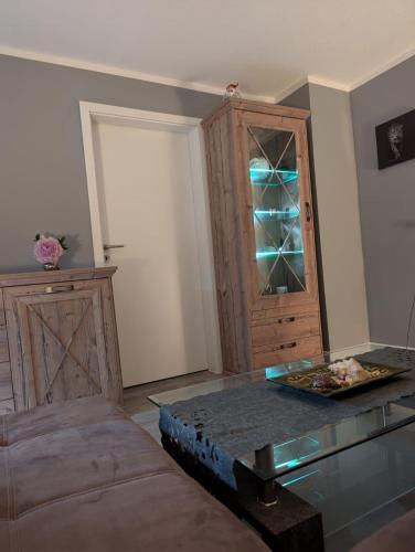 a living room with a counter and a cabinet at Stadtnah an der Förde 7 HH M EG in Flensburg