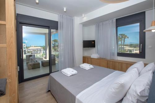 Postel nebo postele na pokoji v ubytování Varko Premium Villas