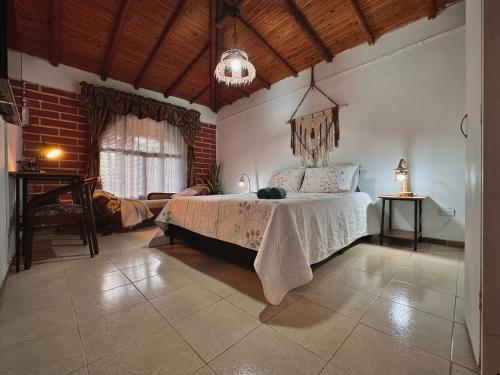 Postel nebo postele na pokoji v ubytování Casa Amaru
