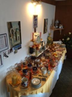 a long table filled with food and other items at Hotel Del Sol in Bad Wildungen