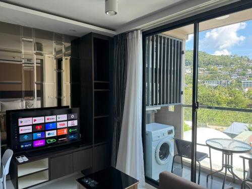TV a/nebo společenská místnost v ubytování Top floor apartment at Aristo by Lofty