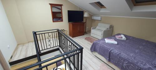 Ένα ή περισσότερα κρεβάτια σε δωμάτιο στο Lena 5 Apartmants