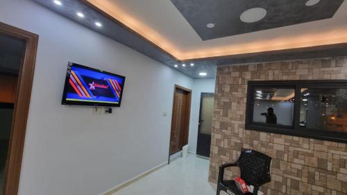 TV a/nebo společenská místnost v ubytování City centre Apartment