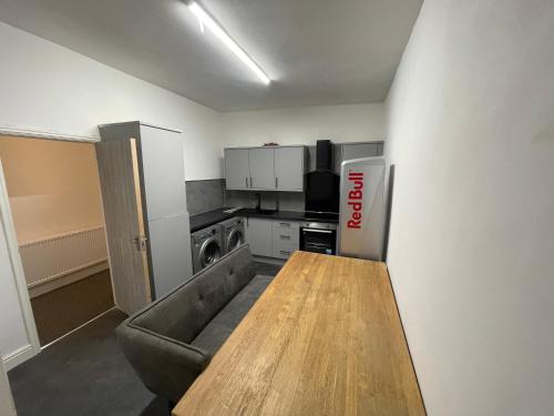 Una cocina o cocineta en Pc home Room A